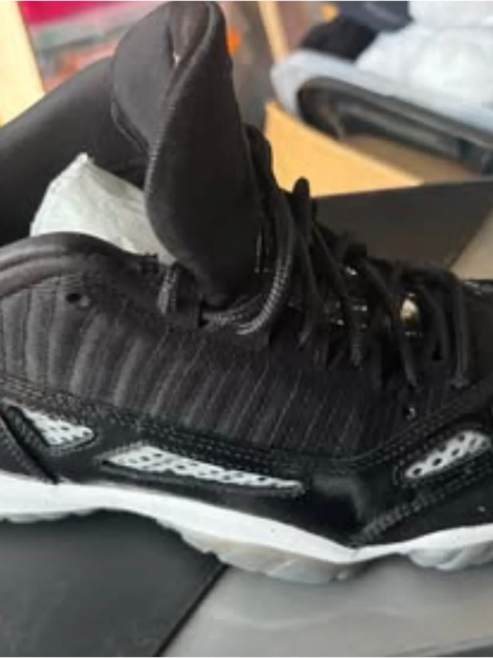Jordan Retro Low IE Sneakers in Black and White